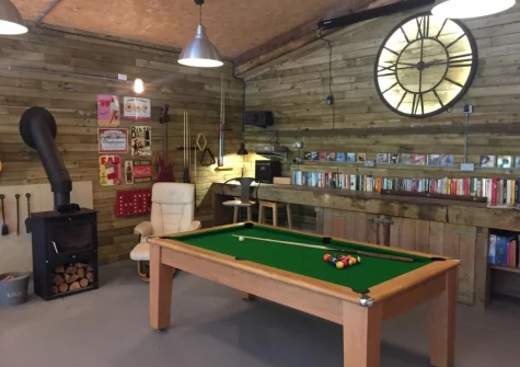 The shared games barn with home cinema at Primrose Cottage at Greatrock Farm, Hennock
