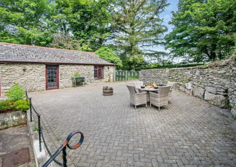 The patio & alfresco dining area at Primrose Cottage, Camelford