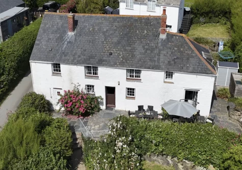The terrace, alfresco dining area & garden at Primrose Cottage, Treyarnon