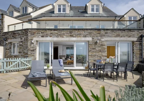 The terrace, alfresco dining & outdoor sitting area at Puffins at Ocean Blue, Treyarnon