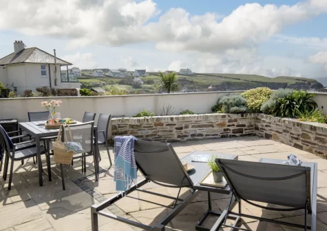 The terrace, alfresco dining & outdoor sitting area at Puffins at Ocean Blue, Treyarnon