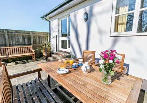 The patio & alfresco dining area at Pyworthy Cottage, North Tamerton