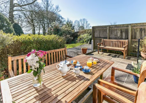 The patio & alfresco dining area at Pyworthy Cottage, North Tamerton