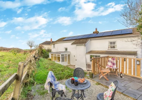 The elevated terrace, barbecue & alfresco dining area at Quarry Cottage, Veryan