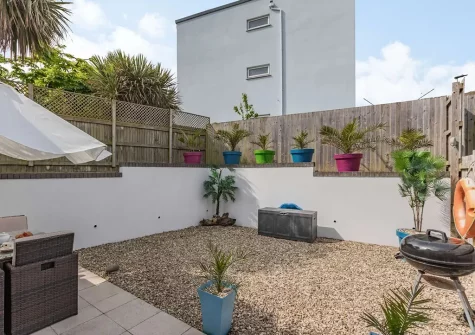 The patio, barbecue & alfresco dining area at Queens Retreat, Westward Ho!