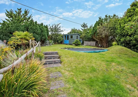 The sunken trampoline & garden at Quintin Cottage, Landkey