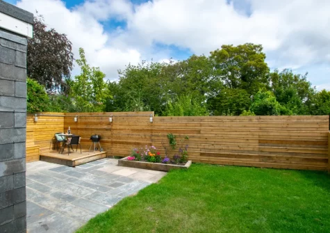 The patio, barbecue, alfresco dining area & enclosed lawned garden at Radfords Cottage, Egloshayle