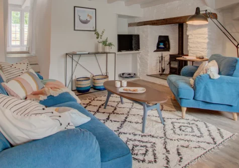 Radfords Cottage, Egloshayle is a romantic one-bedroom retreat with a private sun-trap garden, a cosy wood burner and featuring coastal-themed interiors, just a short distance from Wadebridge and the scenic Camel Trail, ideal for couples.