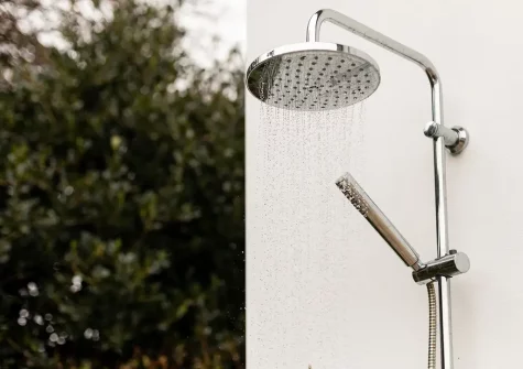The heated outdoor shower is perfect for rinshing off after a fun day at the beach