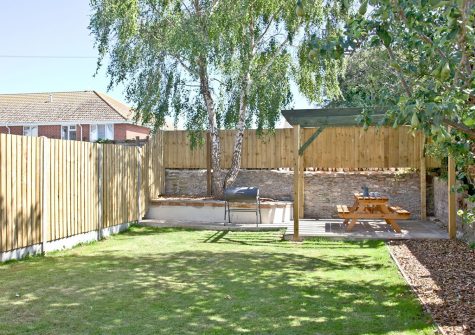 The garden & barbecue area at Red Sails, Brixham