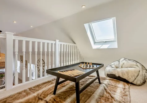 The mezzanine snug at Ridd Cottage, Weare Giffard