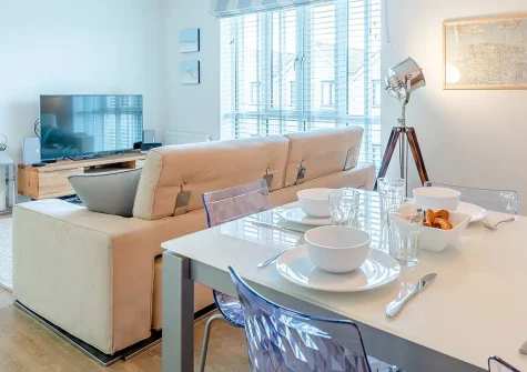 Ridge View Apartment, Westward Ho! is a stylish two-bedroom coastal retreat with floor-to-ceiling windows and stunning views. Enjoy modern interiors, private parking, easy beach access, and proximity to North Devon's charming villages and sites.