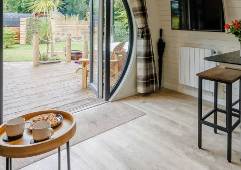 River Avon Retreat, Avonwick is a romantic studio pod nestled beside the peaceful River Avon, that features a private hot tub, cosy fire pit, and dry heat sauna, together with stunning South Devon countryside and coast just moments away.