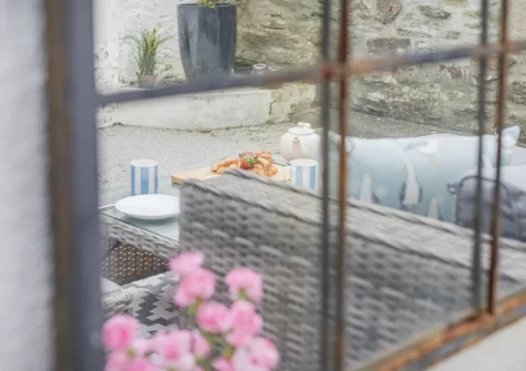 The enclosed terrace & outdoor sitting area at River Watch, Fowey