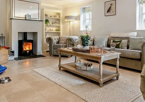 Riverbank Rose, Relubbus is a magnificent 4-bedroom luxury cottage featuring indulgent hot tub, fully equipped outdoor kitchen & sunken fire pit. Perfectly positioned between stunning countryside & captivating coast for amazing family holidays.