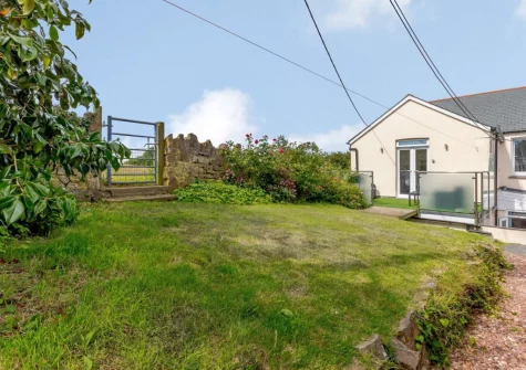 The patio & enclosed rear garden at Rivers Meet, Instow