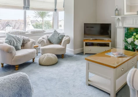 Rivers Meet, Instow is a stunning Victorian property sleeping eight in the heart of this charming coastal village, featuring original period details, dual lounges with wood burner, and spectacular estuary views, moments from golden sandy beaches.
