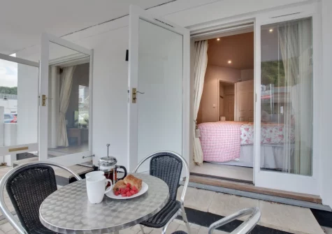 The partially enclosed patio & alfresco dining area at Rivers Reach, Fowey