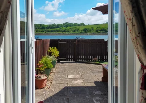 Step out into the patio garden & alfresco dining area at Riverside Mews, Bideford