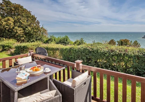 The decked terrace & alfresco dining area at Riviera Bay, Brixham