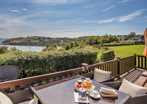 The decked terrace & alfresco dining area at Riviera Bay, Brixham