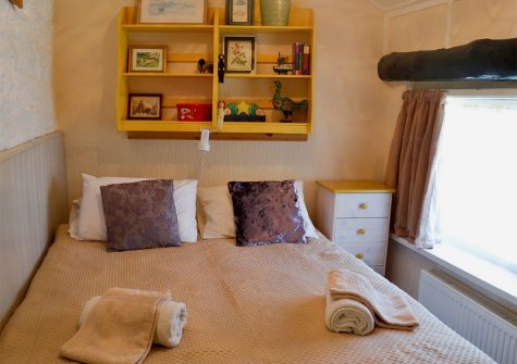 Bedroom #2 with a double bed at Robin Cottage, Brixham