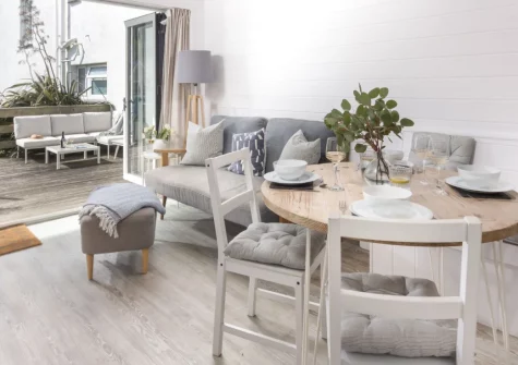 Robin, Polzeath is a charming two-bedroom garden holiday home tucked in the heart of the village, just moments from the beach, with a sunny patio, enclosed garden, and easy access to Cornwall's finest coastal walks, caf&eacute;s and restaurants.