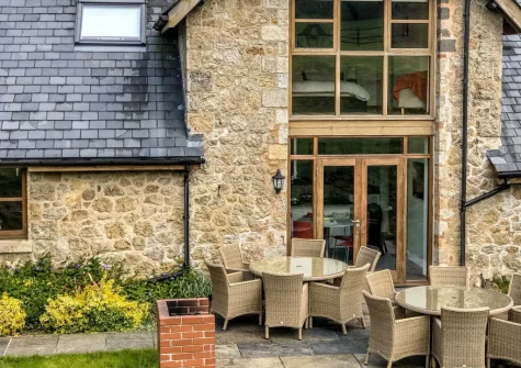 The patio, barbecue & alfresco dining area at Rock Barn, South Tawton