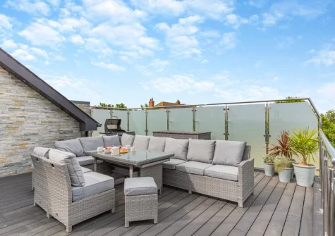 The decked balcony, barbecue & alfresco dining area at Rock View, Little Petherick
