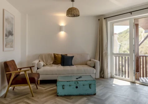 The living area with balcony at Rockham, Croyde