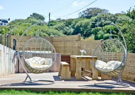 The decked patio & alfresco dining area at Rockpools, Tregurrian