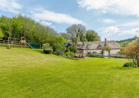 The spacious garden at Rocombe Thatch, Higher Gabwell