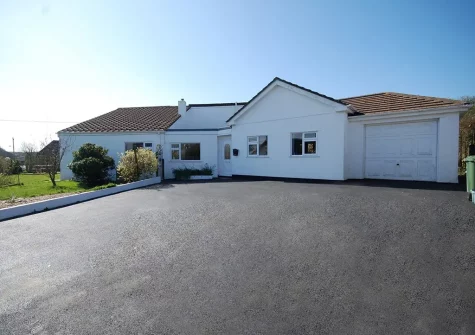 Roscarna is a detached property in Parkham benefiting from outside space, barbecue hut & hot tub
