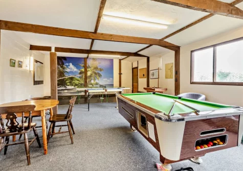 The shared games room at Rose Cottage at Fairview, West Down
