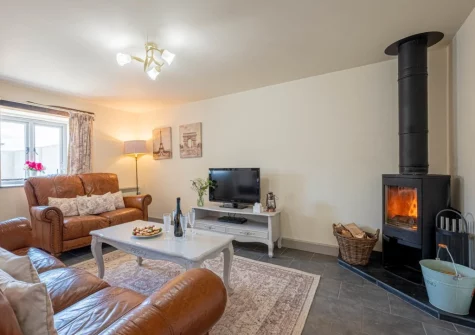 The living room at Rose Cottage at Higher Worthyvale Farm, Camelford