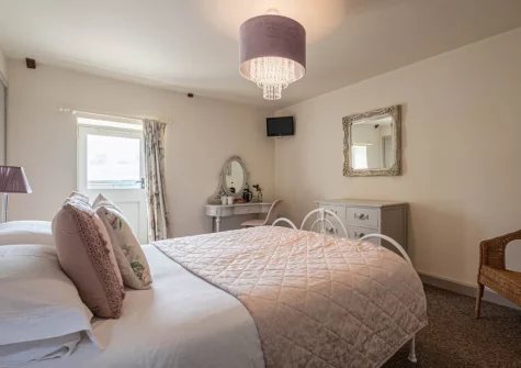Bedroom #1 at Rose Cottage at Higher Worthyvale Farm, Camelford