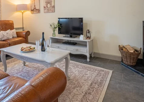 Rose Cottage at Higher Worthyvale Farm, Camelford is a beautifully presented barn conversion featuring a private hot tub, wood burner, enclosed garden, and easy access to Tintagel's legendary castle and North Cornwall's dramatic coastline.