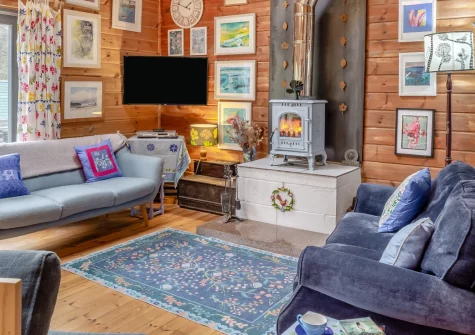 Rose Retreat, Perranporth is a stunning self-built four-bedroom property just not far from golden Perranporth Beach, featuring a private swim spa, entertaining games room, cosy wood burner, and enclosed gardens for memorable family gatherings.