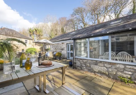 The wraparound terrace at Rosehendra, Rosevidney