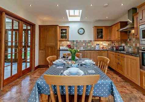 The kitchen & dining area at Roseland Barn, Trenear