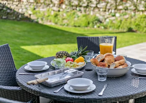 The alfresco dining area & garden at Roseland Barn, Trenear