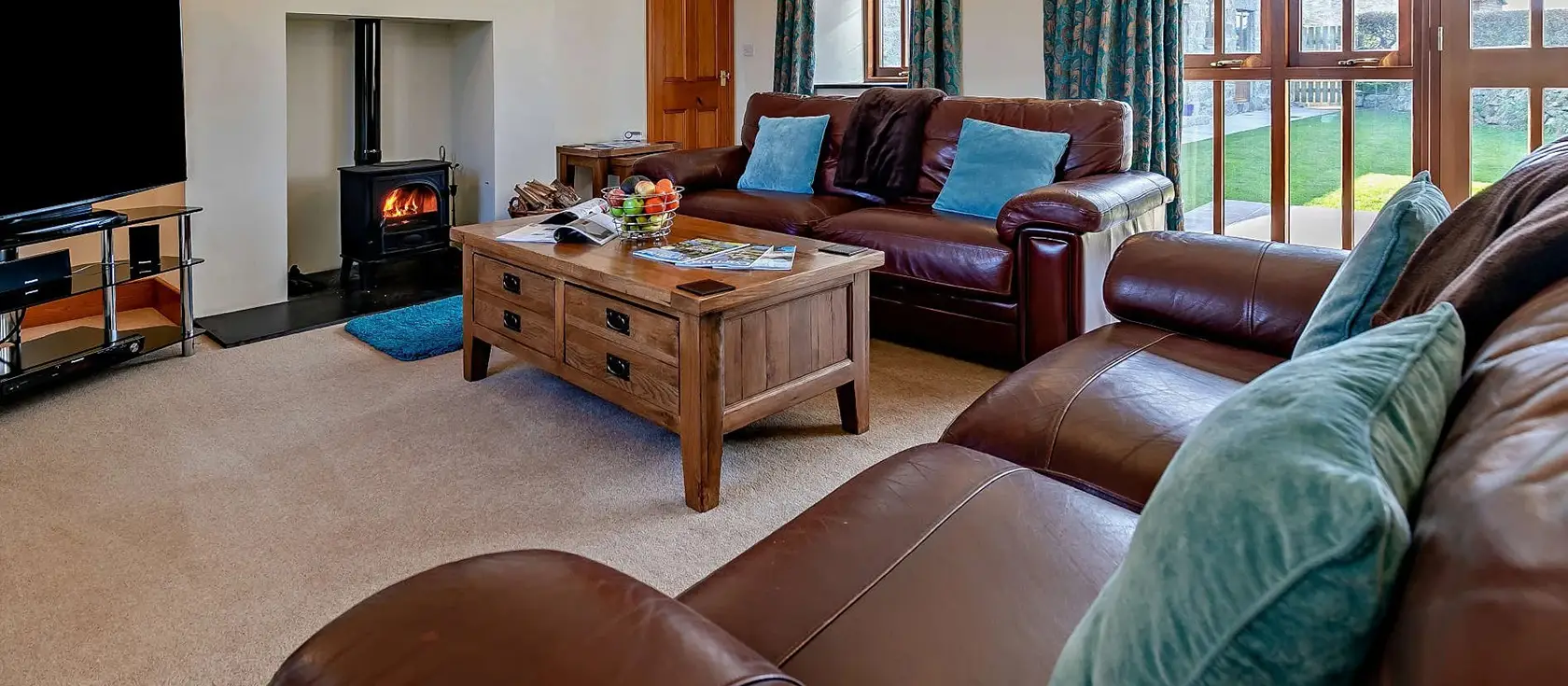 Roseland Barn, Trenear is a beautifully converted spacious barn in West Cornwall's heart. Enjoy modern comforts, enclosed gardens, and easy access to stunning beaches and coastal attractions for truly unforgettable family holidays and memories.