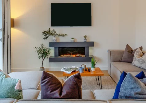 Roselyn, Carbis Bay is an ultra-modern reverse-level home with five bedrooms, sun-soaked views, and direct access to Carbis Bay. Enjoy an enclosed garden, family spaces, and proximity to St Ives's galleries and beaches for memorable holidays.