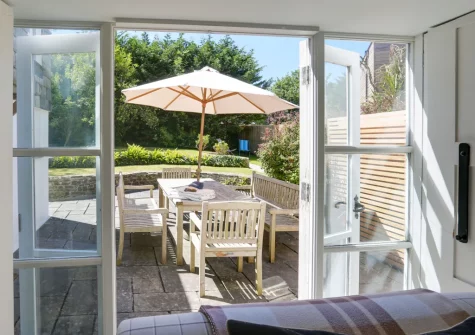 Step out on to the sheltered patio, with alfresco dining area, at Rosemayne, Rock