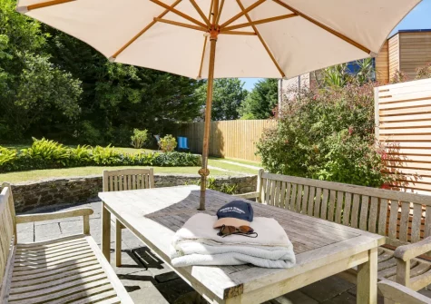 The sheltered patio, alfresco dining area & lawned garden at Rosemayne, Rock