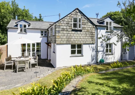 The sheltered patio, alfresco dining area & lawned garden at Rosemayne, Rock