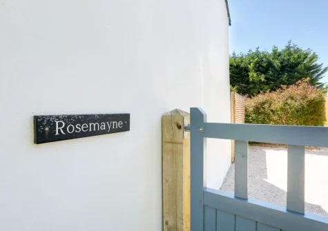 Rosemayne is a spacious cottage with coastal chic interiors with slate floors, wood burner & original features