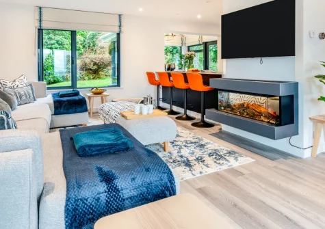 Rosemerryn, Carbis Bay is a spectacular four-bedroom coastal retreat with breathtaking Atlantic views, contemporary interiors, and a magnificent deck with firepit, perfectly positioned between golden Carbis Bay beach and vibrant St Ives town.