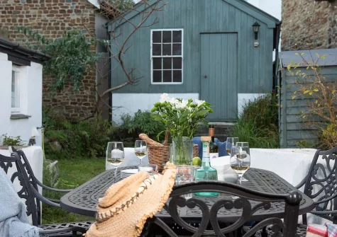 The patio, alfresco dining area & garden at Roseneath, St Agnes