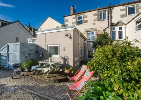 The courtyard garden, barbecue & alfresco dining area at Rosevean, Marazion